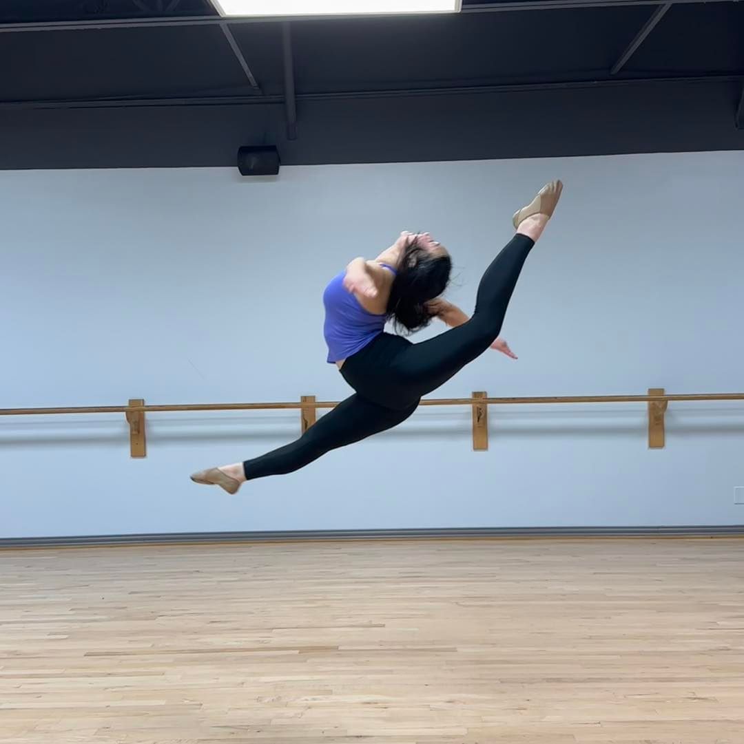 advanced dancer in a jazz leap